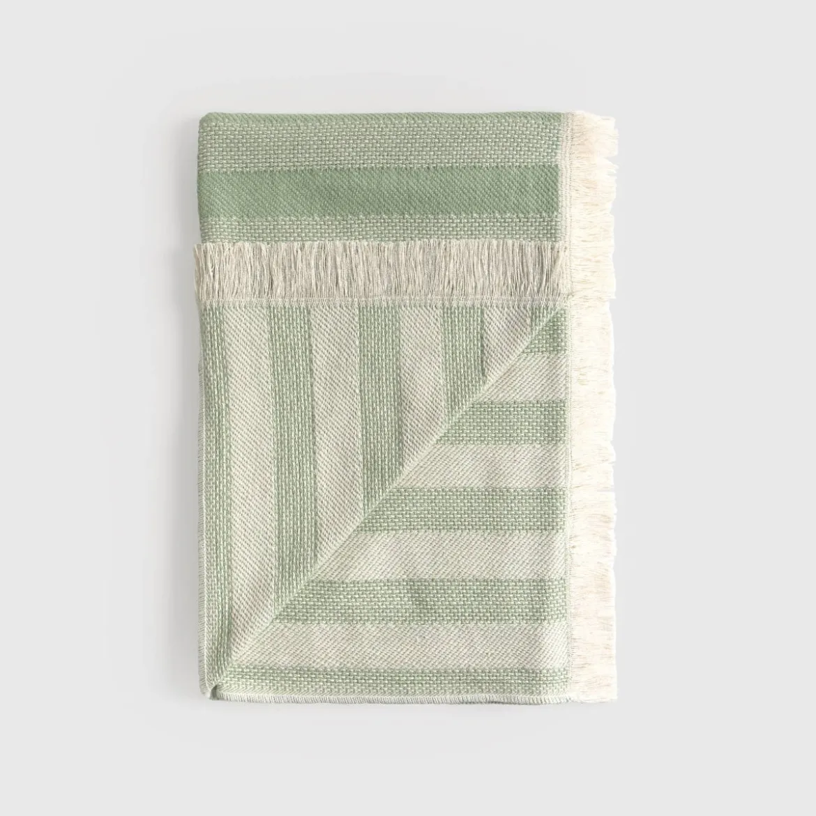 Plaid de rayas tejidas verde con flecos Primpla